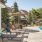 a pool with chairs and umbrellas