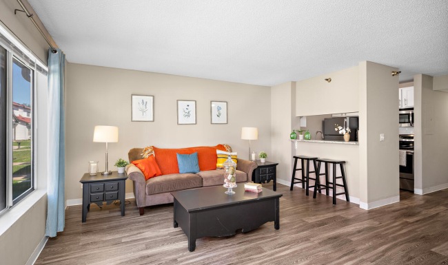 living area that includes ample seating spaces and bright lighting