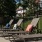 a deck with chairs and tables