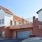 a brick building with a garage